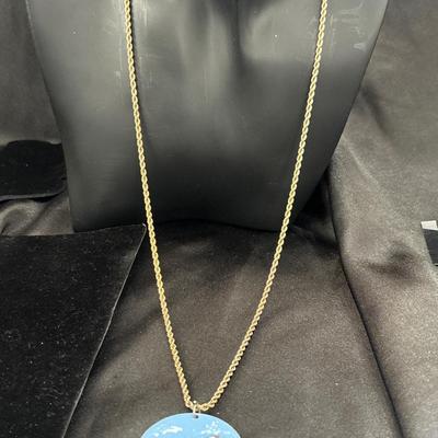 Gold tone with blue circle of white bird pendant necklace