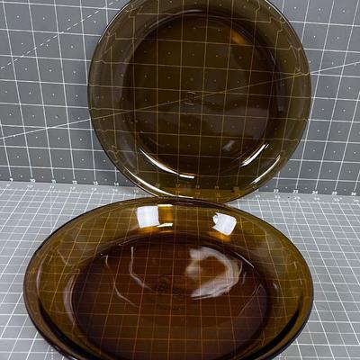 2 Anchor Hocking Brown Pie Plates. 