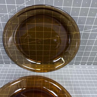 2 Anchor Hocking Brown Pie Plates. 