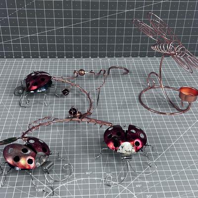 Copper Colored Lady Bug Mobil and Dragonfly Votive Holder. 