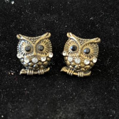 Gold tone owl earrings
