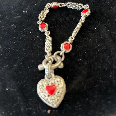 Silver tone heart charm necklace
