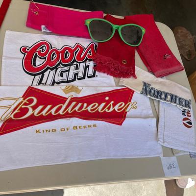 Towels & really big sunglasses