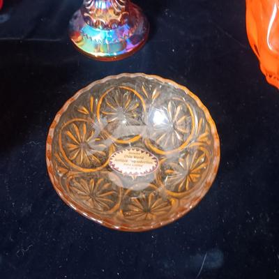 A COLLECTION OF VINTAGE COLORED GLASS PIECES