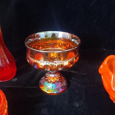 A COLLECTION OF VINTAGE COLORED GLASS PIECES