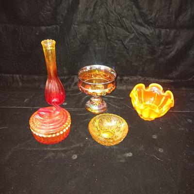 A COLLECTION OF VINTAGE COLORED GLASS PIECES