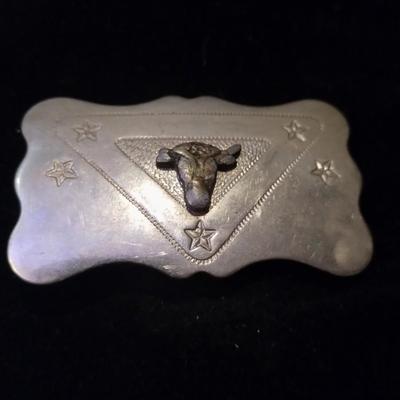 Silver belt buckle