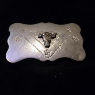 Silver belt buckle