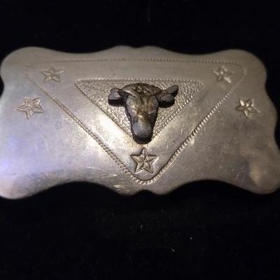 Silver belt buckle