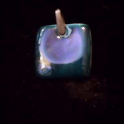 Silver pendant for a necklace