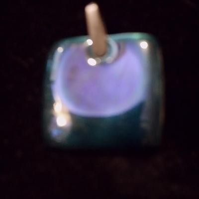 Silver pendant for a necklace