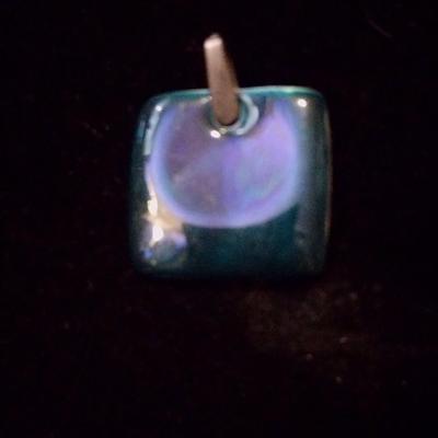 Silver pendant for a necklace