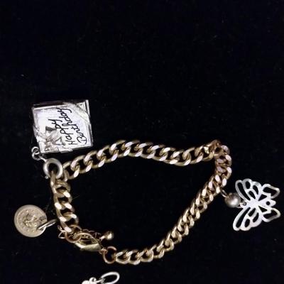 Gold bracelets with charms