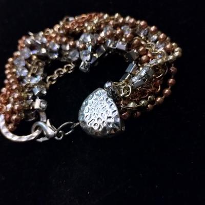 Feed and silver bracelet