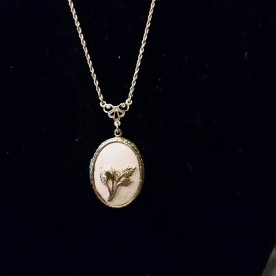 Gold chain with a locket