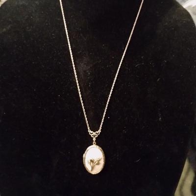 Gold chain with a locket