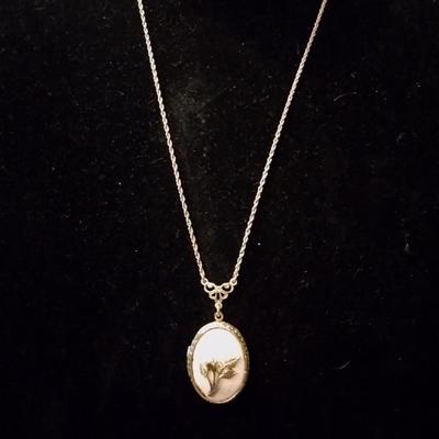 Gold chain with a locket