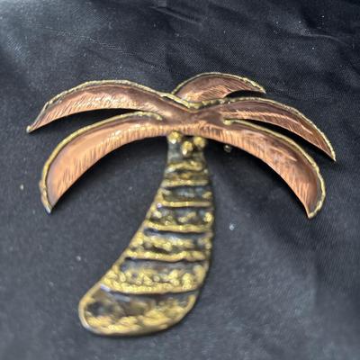 Gold tone and bronze tone made in Mexico palm tree