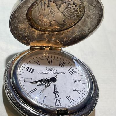 Vintage American Heritage Silver Half Dollar Coin Pocket Watch Needs Battery & Still has the New Plastic on the Crystal.