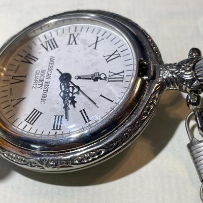 Vintage American Heritage Silver Half Dollar Coin Pocket Watch Needs Battery & Still has the New Plastic on the Crystal.