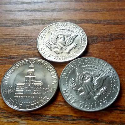 LOT 46 THREE EARLY KENNEDY HALF DOLLARS