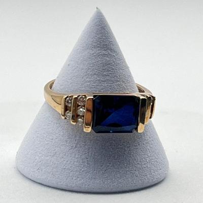 LOT 45: 10K Gold Size 8 Ring with Diamonds and Sapphire- 3.4 grams total weight