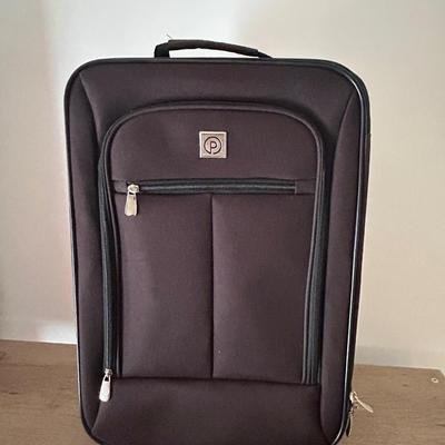 LOT 5: Two Carry On Size Luggage
