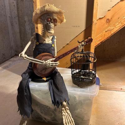 LOT 28: Musical, Animated Banjo Playing Skeliton & Bird Cage