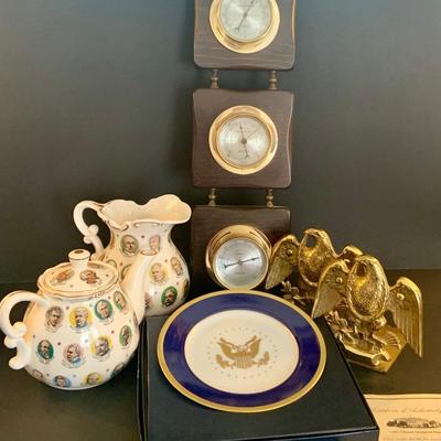 LOT:33: Americana Collection Featuring Baldwin Brass Bookends, Springfield Instruments Barometer. Chadwick-Miller 1965 Presidents Teapot...