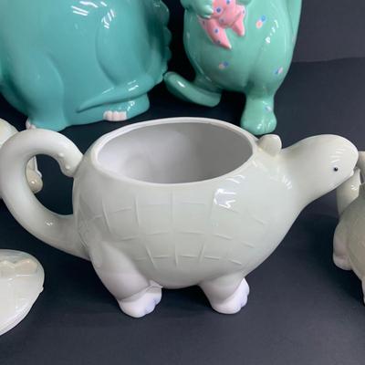 LOT:37: Whimsical Dinosaur Tea Party - Henriksen Import Tea Pot, Creamer Sugar Bowl, Home Concepts Cookie Jar and Vintage Ceramic Pitcher