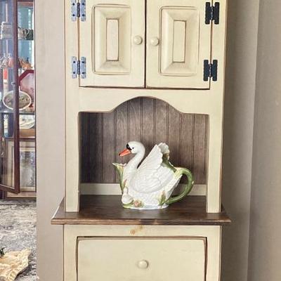 LOT 83: Farmhouse Cabinet with Decorative Swan and Pheasant Pitchers