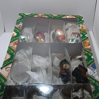LOT 117: Six Old World Christmas Ornaments w/ Checklist & One Other Ornament