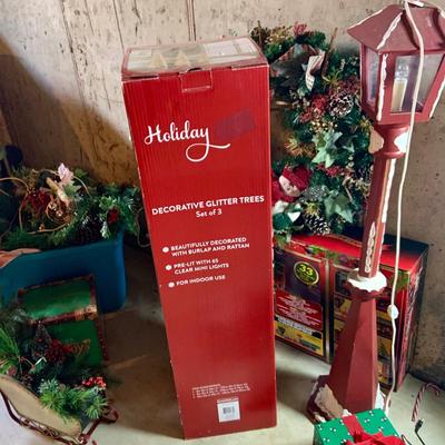 LOT:150: Indoor and Outdoor Holiday Decor with North Pole Express Train and Set of 3 Holiday Decorative Glitter Trees in Original Boxes,...