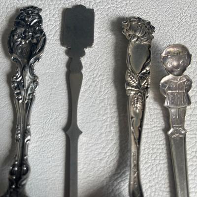 4-Piece Set of Collectors Spoons 
