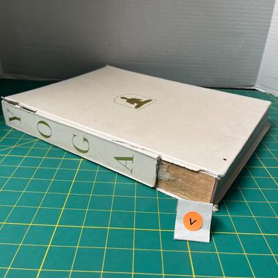 Yoga Book (with slightly torn spine)