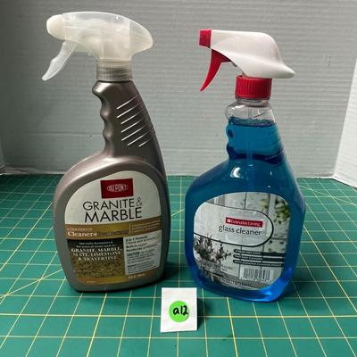 Cleaning Supplies - Granite & Marble Cleaner and Glass Cleaner Bottles