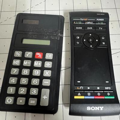 Miscellaneous Calculator, Remote and Glossy Printer Paper and Label Maker