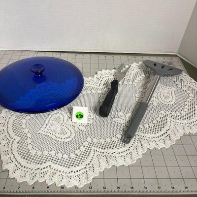 Pot Lid, 2-Prong Utensil, Spatula and Lace Table covering