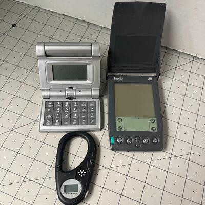 Calculator, Pedometer Walking Tracker and Palm Pilot Computing Platform