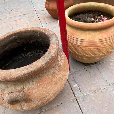 4 medium flower pots