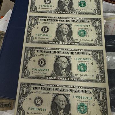 Uncut sheet of U S one Dollar bills