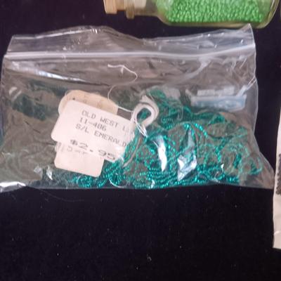 AN ASSORTMENT OF CRAFT SEED BEADS