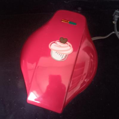 MINI CUPCAKE MAKER AND A DESSERT PLATE ON A PEDESTAL