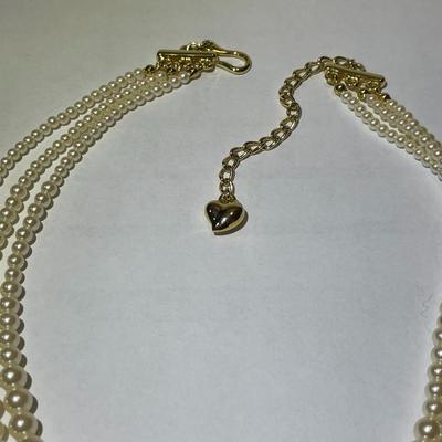 Vintage Signed Carolee Triple-Strand Graduated Lustrous Faux White Pearl w/Gold-tone Clasp Adjustable Necklace in VG Condition.