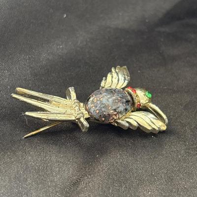 Silver tone bird pin