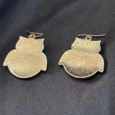 Gold tone owl earrings with floral middle