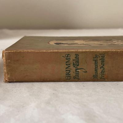 Antique Books Including A Christmas Carol, Brave Men, and 20,000 Leagues Under The Sea (UB-DZ)