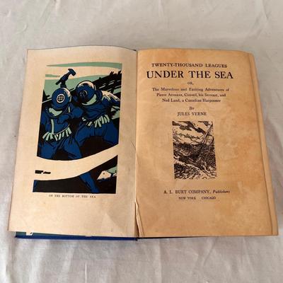 Antique Books Including A Christmas Carol, Brave Men, and 20,000 Leagues Under The Sea (UB-DZ)