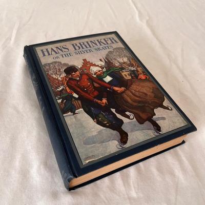 Antique Books Including A Christmas Carol, Brave Men, and 20,000 Leagues Under The Sea (UB-DZ)