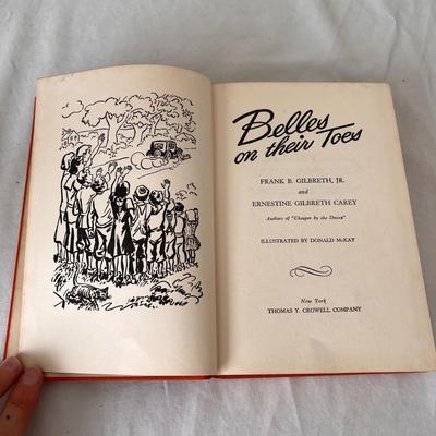 Antique Books Including A Christmas Carol, Brave Men, and 20,000 Leagues Under The Sea (UB-DZ)